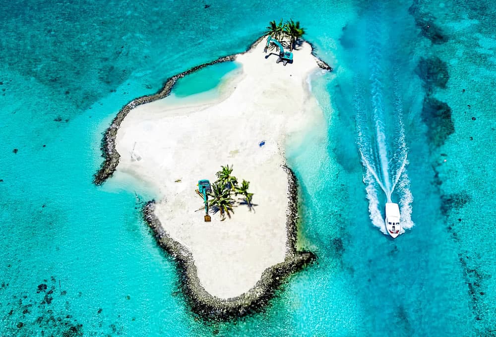 Island top view with boat Maldives Holiday
